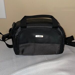 Canon camera bag black carrying case travel padded zipper pockets strap handle